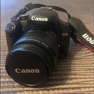 Canon Rebel EOS T1i camera with lens  and zoom lens. Instruction booklet and bag